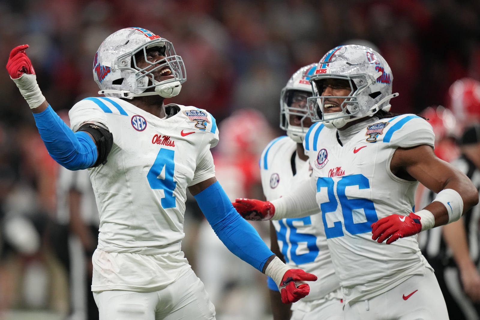 Mississippi linebacker Suntarine Perkins (4) celebrates a fumble recovery against Georgia during the second half of the Sugar Bowl NCAA college football playoff quarterfinal game, Thursday, Jan. 1, 2026, in New Orleans. (AP Photo/Matthew Hinton)