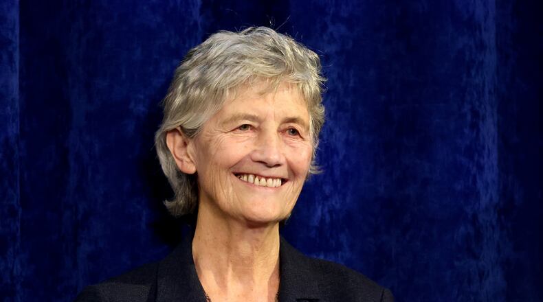 Catherine Connolly smiles to supporters after being elected as the new President of Ireland at Dublin Castle, Ireland, Saturday, Oct. 25, 2025. (AP Photo/Peter Morrison)