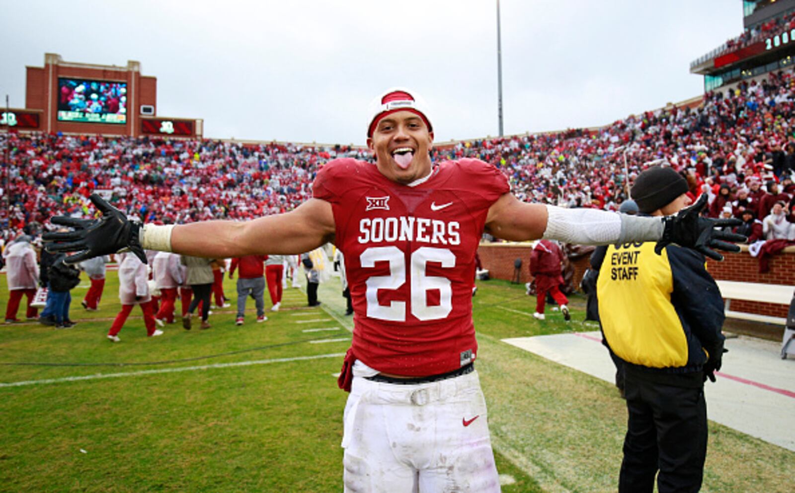 NORMAN, OK - DECEMBER 3: Linebacker Jordan Evans #26 of the Oklahoma Sooners celebrates after the game against the Oklahoma Sooners December 3, 2016 at Gaylord Family-Oklahoma Memorial Stadium in Norman, Oklahoma. Oklahoma defeated Oklahoma State 38-20 to become Big XII champions. (Photo by Brett Deering/Getty Images)