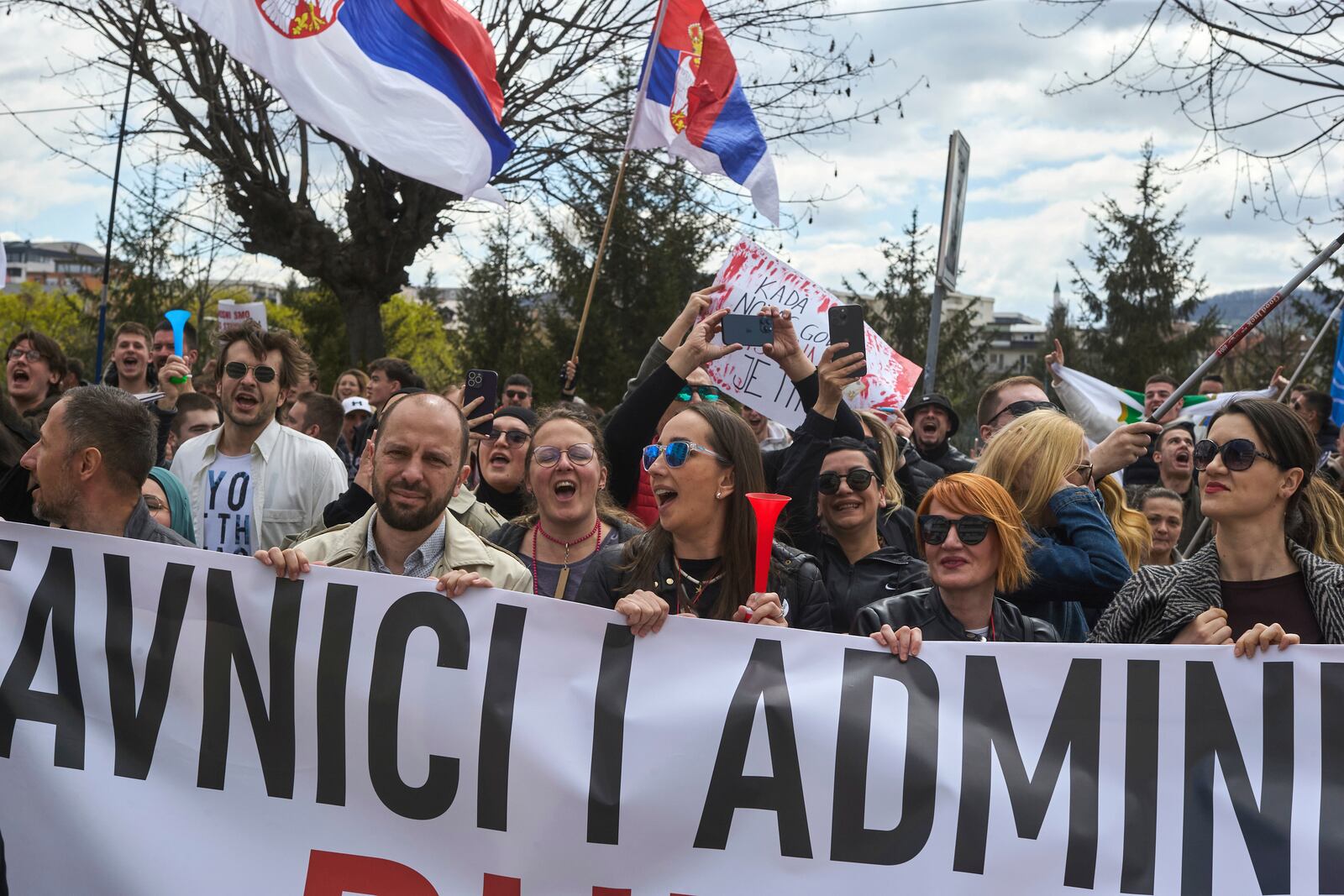 People chant during an anti-corruption protest led by university students in the southwestern town of Novi Pazar, Serbia, Saturday, April 12, 2025. (AP Photo/Marko Drobnjakovic)