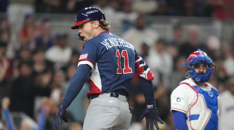 United States' Gunnar Henderson (11) celebrates after hitting a home run during the fourth inning of a World Baseball Classic semifinal game against the Dominican Republic, Sunday, March 15, 2026, in Miami. (AP Photo/Lynne Sladky)