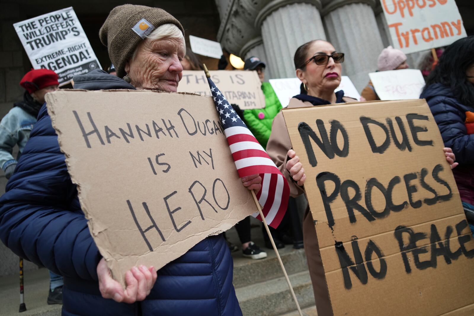 Supporters of Judge Hannah Dugan hold a rally in Milwaukee at the U.S. Courthouse in Milwaukee on Friday, April 25, 2025. (Lee Matz/Milwaukee Independent via AP)