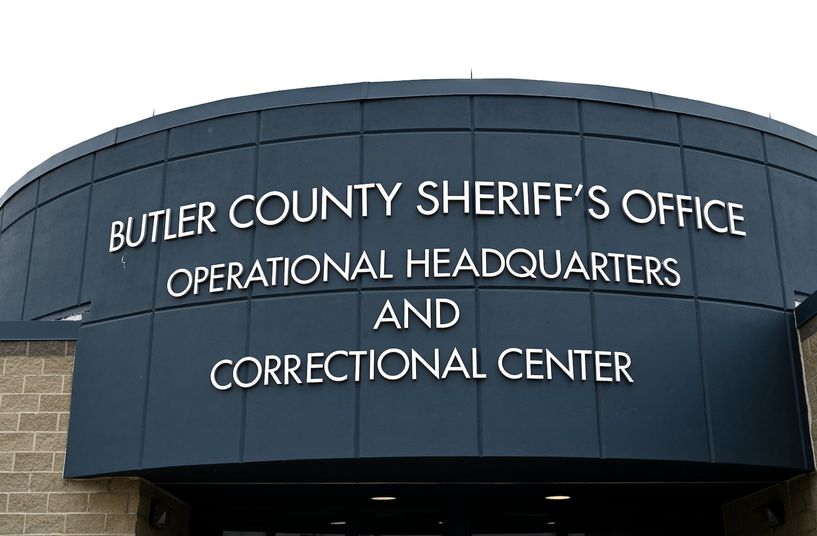 Butler County Sheriff Richard Jones has taken a hard stance on immigration since taking office more than two decades ago. He had 10 deputies credentialed to serve as ICE agents in the county, and said he plans to have more deputies eventually go through the training. Pictured is the outside of the jail on Wednesday, July 9, 2025. MICHAEL D. PITMAN/STAFF