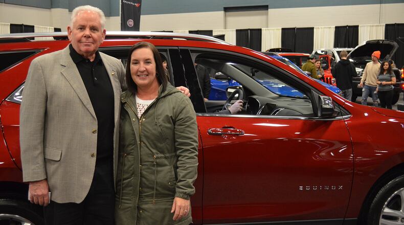 A highlight of the 2019 Dayton Auto Show, held Feb. 21-24 at the Dayton Convention Center, was the chance to win a two-year lease on a 2019 Chevrolet Equinox. The winner was Elizabeth Lauchard; she was congratulated by Joe Johnson of Joe Johnson Chevrolet, who represented the Miami Valley Chevy Dealers that gave away the lease Feb. 24. Contributed photo
