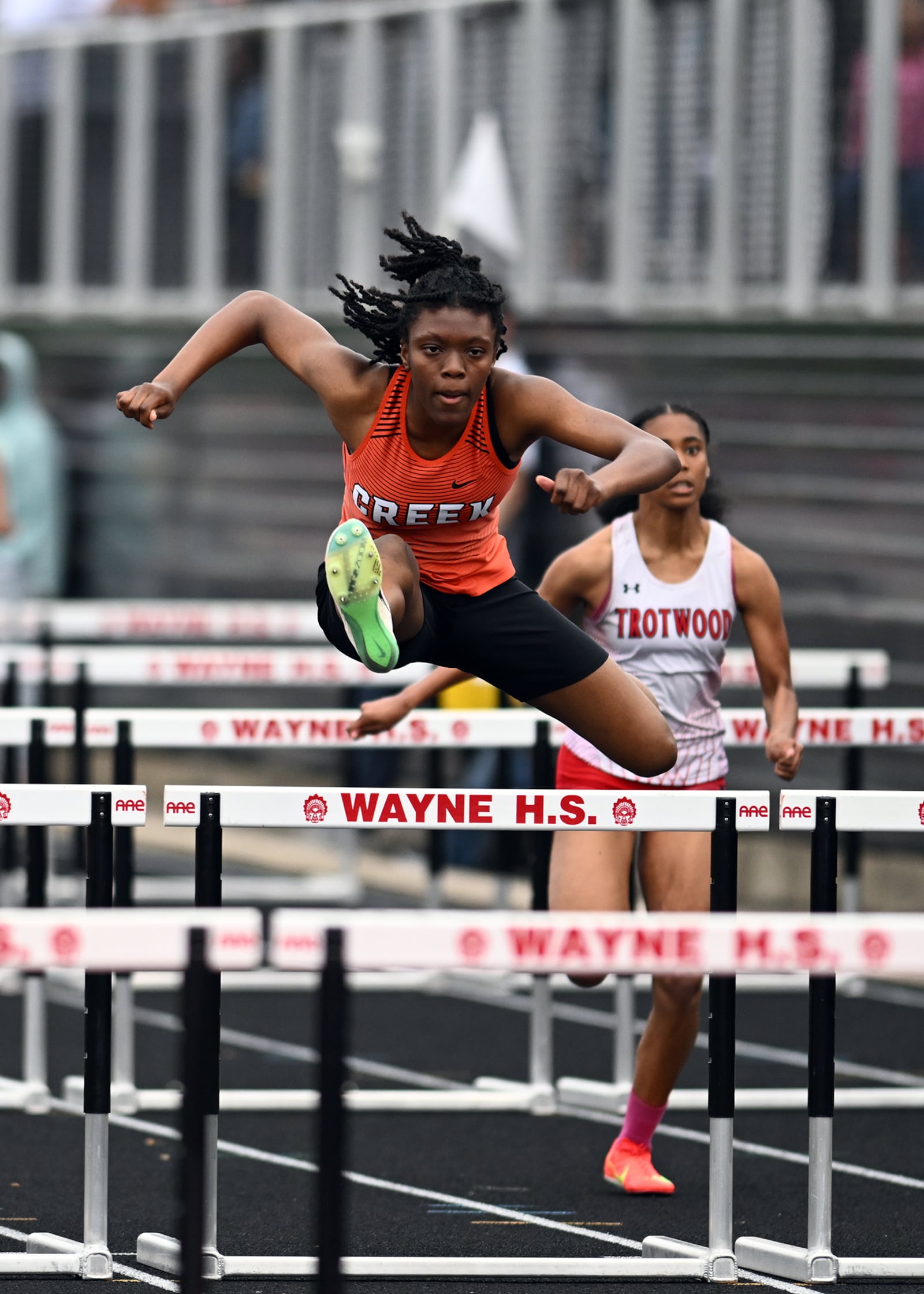 Beavercreek's Faith Brown competes in the 100 hurdles at the Wayne Invitational on Friday, May 2 at Heidkamp Stadium in Huber Heights. Nick Falzerano/CONTRIBUTED PHOTO