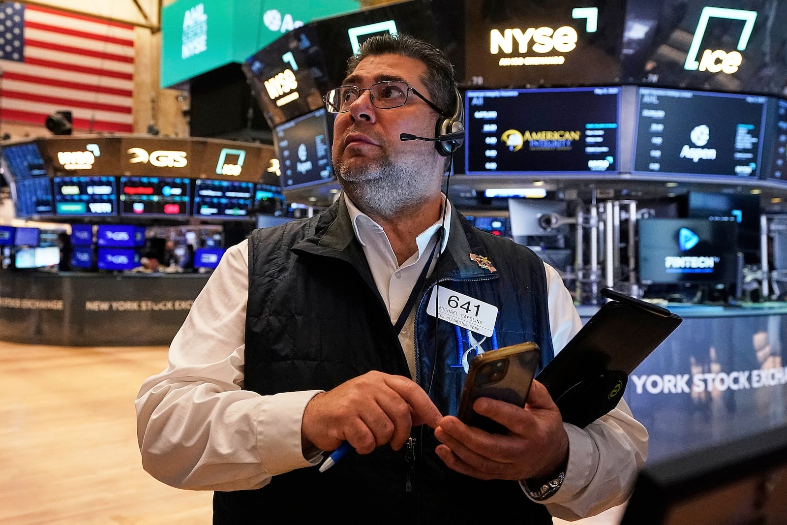 Trader Michael Capolino works on the floor of the New York Stock Exchange, Thursday, May 8, 2025. (AP Photo/Richard Drew)