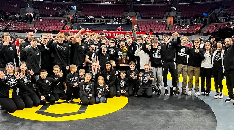 The Graham High School wrestling team celebrates their 25th consecutive team crown at the OHSAA State Wrestling Championships on Sunday, March 15, 2026 at Ohio State University's Schottenstein Center. GEOFF NEVILLE / CONTRIBUTING WRITER