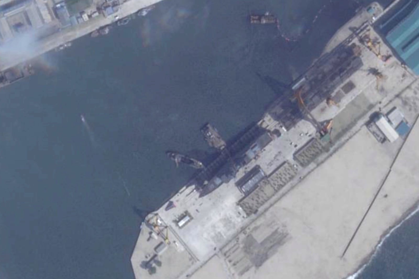 This satellite image from Planet Labs PBC shows a North Korean destroyer before it is put to sea in Chongjin, North Korea, Tuesday, May 20, 2025. (Planet Labs PBC via AP)