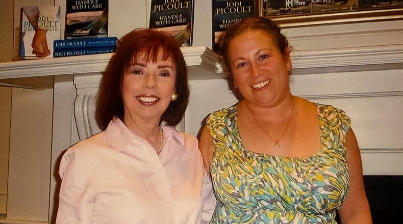 For 35 years Sharon Kelly Roth, left, was director of public relations for Books&Co. Here she is pictured with Jodi Picoult who, says Roth, writes "contemporary, engaging stories that are popular with book clubs. 
CONTRIBUTED