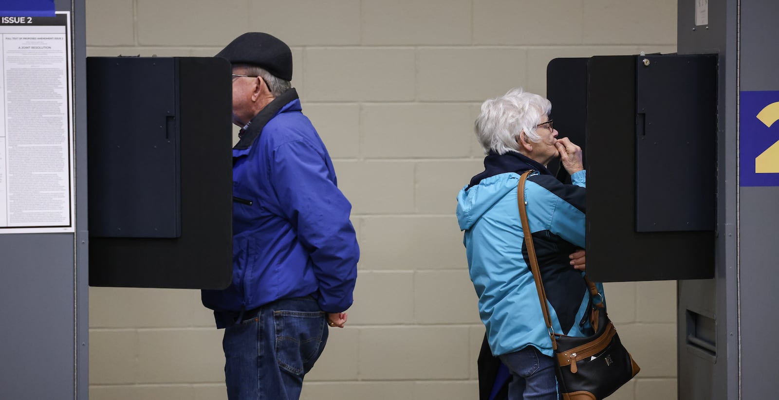 Voters at a polling location at New Season Ministry in Huber Heights contemplate issues on Tuesday, May 6. BRYANT BILLING / STAFF