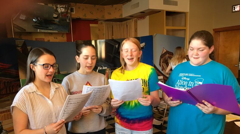 Youth Arts Ambassadors (from left) Ava Sullivan, Natalie Berry, Kyla Collins and Eleni Linardos rehearse for their dinner theater performance. CONTRIBUTED