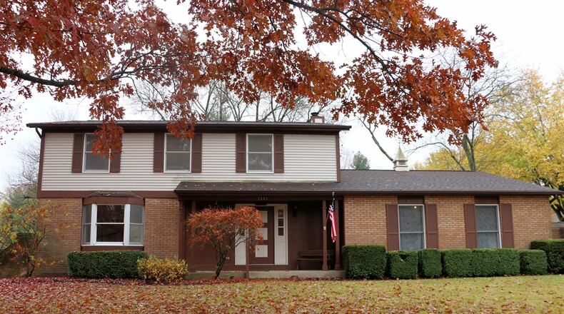 The brick-and-frame house has about 2,140 square feet of living space, plus the basement. The house sits well off the street with a side-entry, two-car garage. Contributed photos by Kathy Tyler