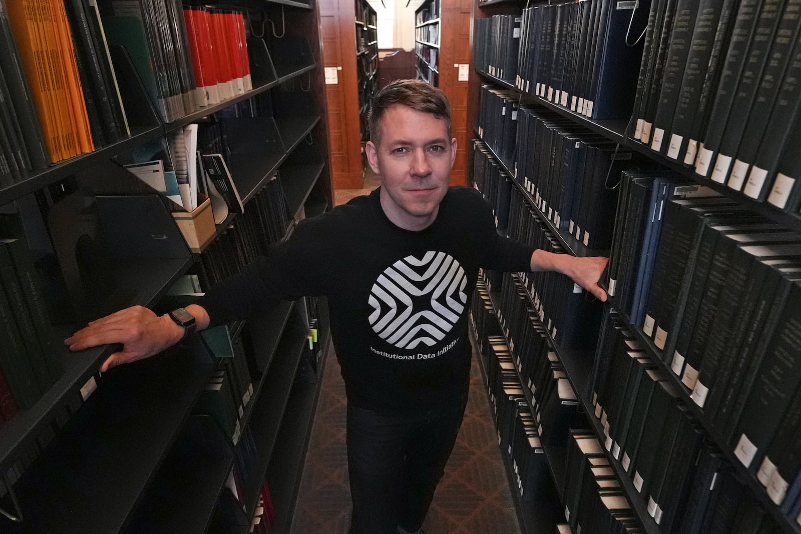 Greg Leppert, executive director at the Institutional Data Initiative, poses at Langdell Hall, which houses the Harvard Law School library, Wednesday, Feb. 26, 2025, in Cambridge, Mass. (AP Photo/Charles Krupa)