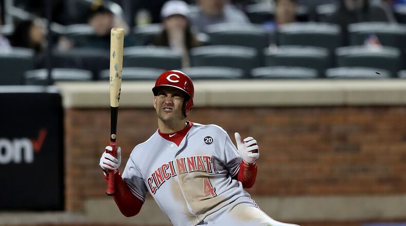 NEW YORK, NEW YORK - APRIL 29: Jose Iglesias #4 of the Cincinnati Reds is hit by a pitch in the eighth inning against the New York Mets at Citi Field on April 29, 2019 in the Flushing neighborhood of the Queens borough of New York City.The Cincinnati Reds defeated the New York Mets 5-4. (Photo by Elsa/Getty Images)
