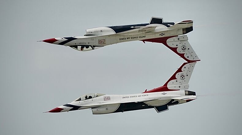 The U.S. Air Force Thunderbirds fly at the Dayton Air Show Sunday, July 23. MARSHALL GORBY/STAFF