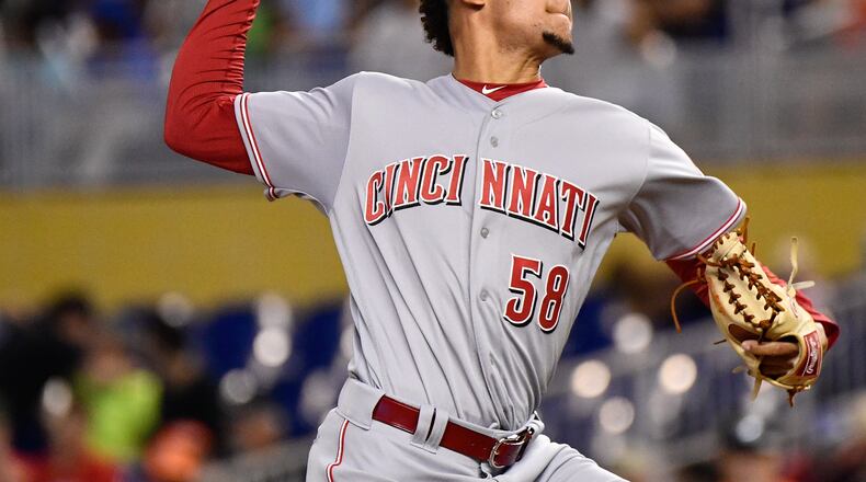 MIAMI, FL - JULY 30: Luis Castillo #58 of the Cincinnati Reds pitches in the first inning during the game between the Miami Marlins and the Cincinnati Reds at Marlins Park on July 30, 2017 in Miami, Florida. (Photo by Mark Brown/Getty Images)