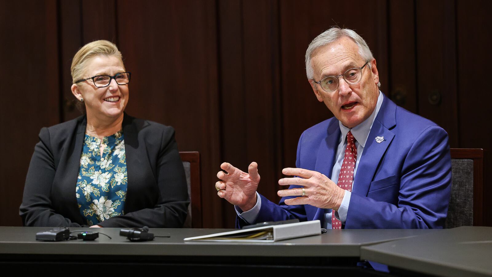 Lt. Gov. Jim Tressel talks as Wright State President Susan Edwards laughs during a visit by Tressel to the university on Thursday. Tressel has been in his position for about two months and is touring various universities around the state. He is the former president of Youngstown State, in addition to previously coaching football there and Ohio State. BRYANT BILLING / STAFF