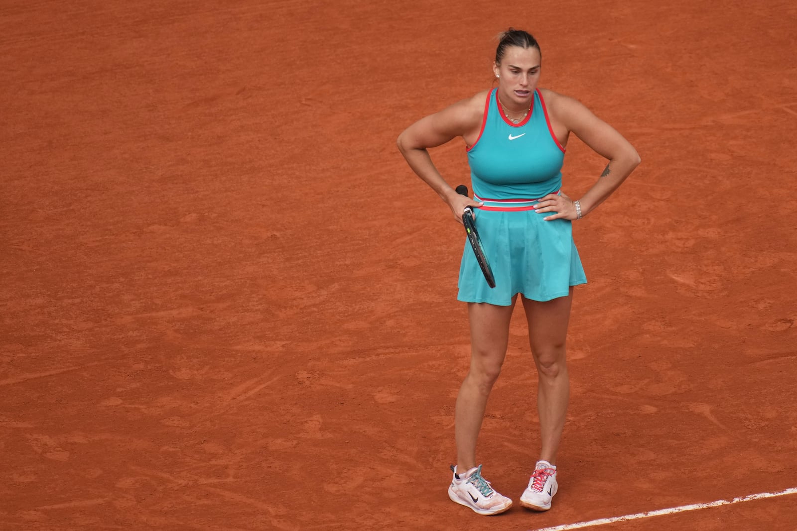 Aryna Sabalenka of Belarus reacts as she plays against Coco Gauff of the U.S. during their final match of the French Tennis Open at the Roland-Garros stadium in Paris, Saturday, June 7, 2025. (AP Photo/Christophe Ena)