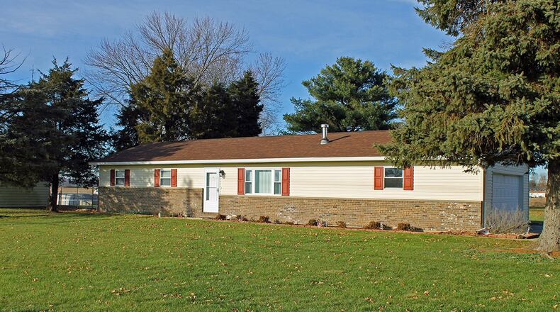 This brick-and-vinyl ranch has about 1,130 sq. ft. of living space with 3 bedrooms and an open floor plan. It also has a side-loading, 2-car garage. CONTRIBUTED PHOTO BY VICKIE KAPNAS
