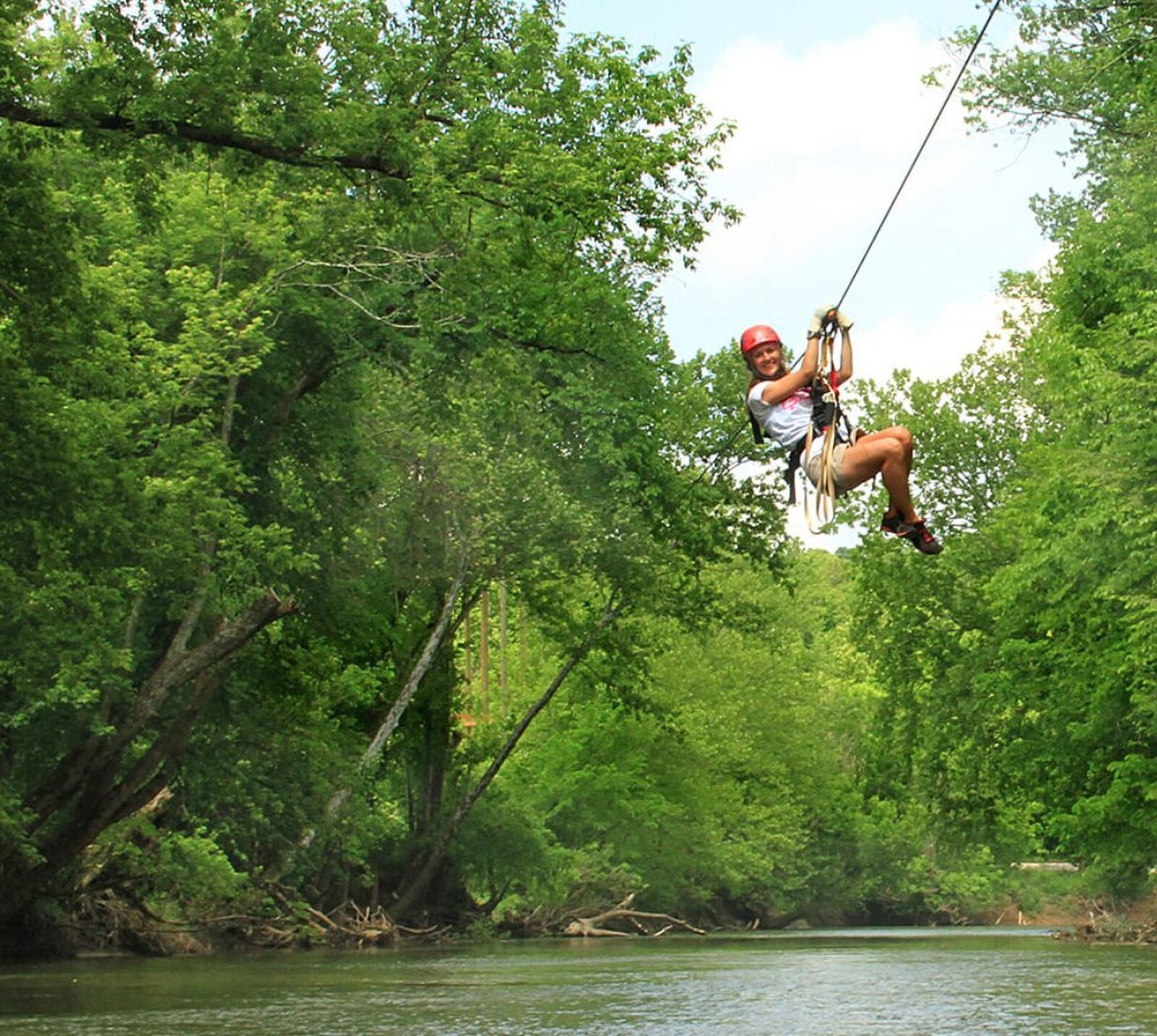 Ziplining through the trees at Hocking Hills Canopy Tours. CONTRIBUTED