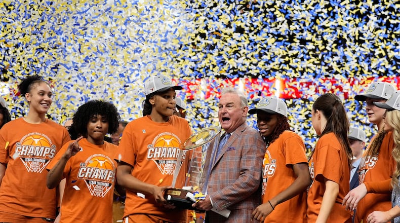 Texas celebrates after their win against South Carolina in an NCAA college basketball game in the final of the Southeastern Conference tournament, Sunday, March 8, 2026, in Greenville, S.C. (AP Photo/Chris Carlson)