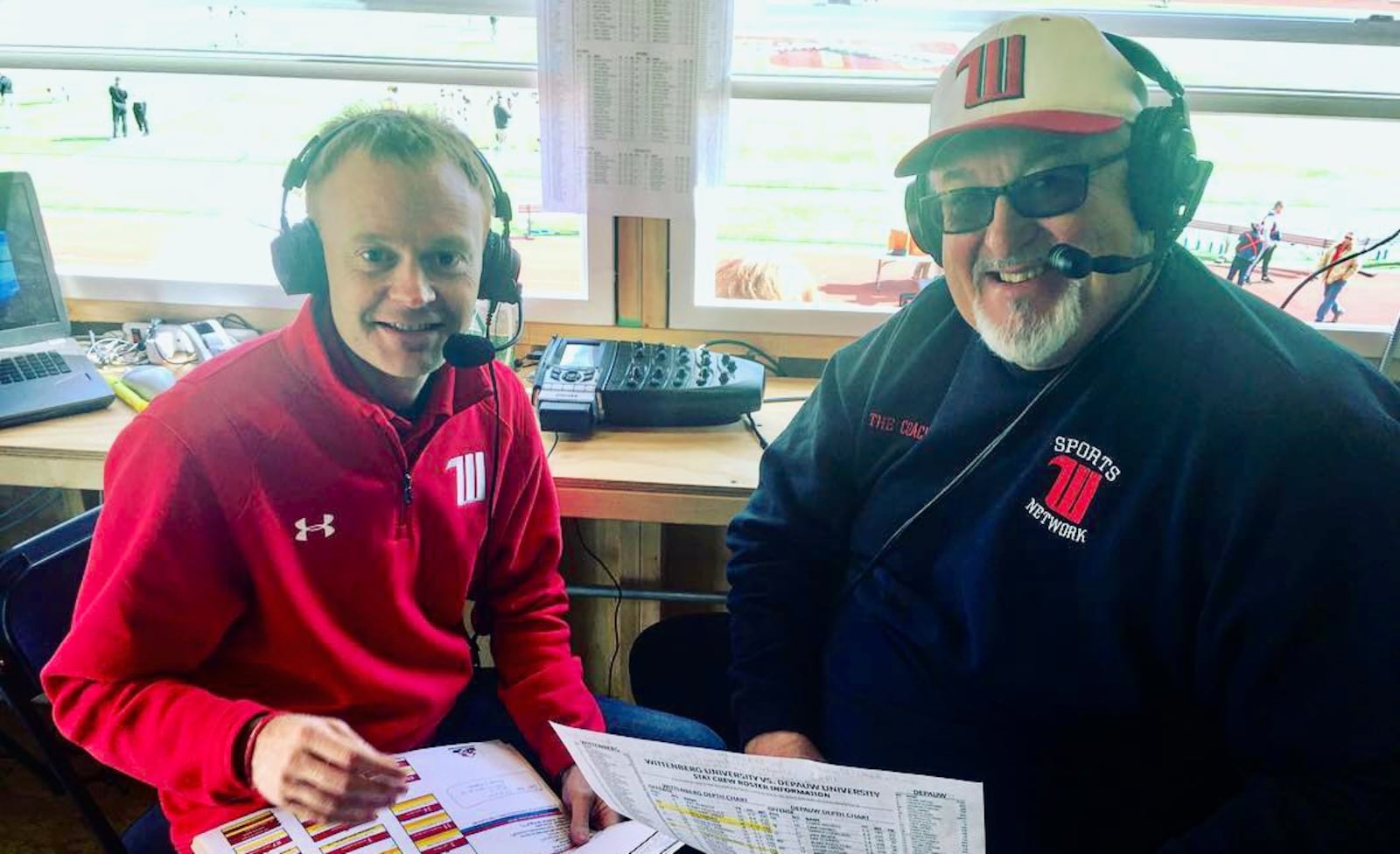 Jim Scoby, right, poses for a photo with Scott Leo in the broadcast booth at Wittenberg's Edwards-Maurer Field in 2018. David Jablonski/Staff