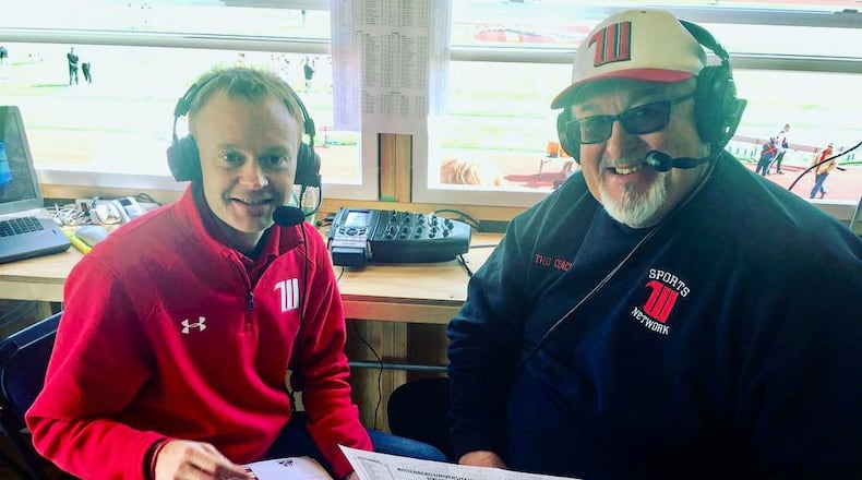 Jim Scoby, right, poses for a photo with Scott Leo in the broadcast booth at Wittenberg's Edwards-Maurer Field in 2018. David Jablonski/Staff