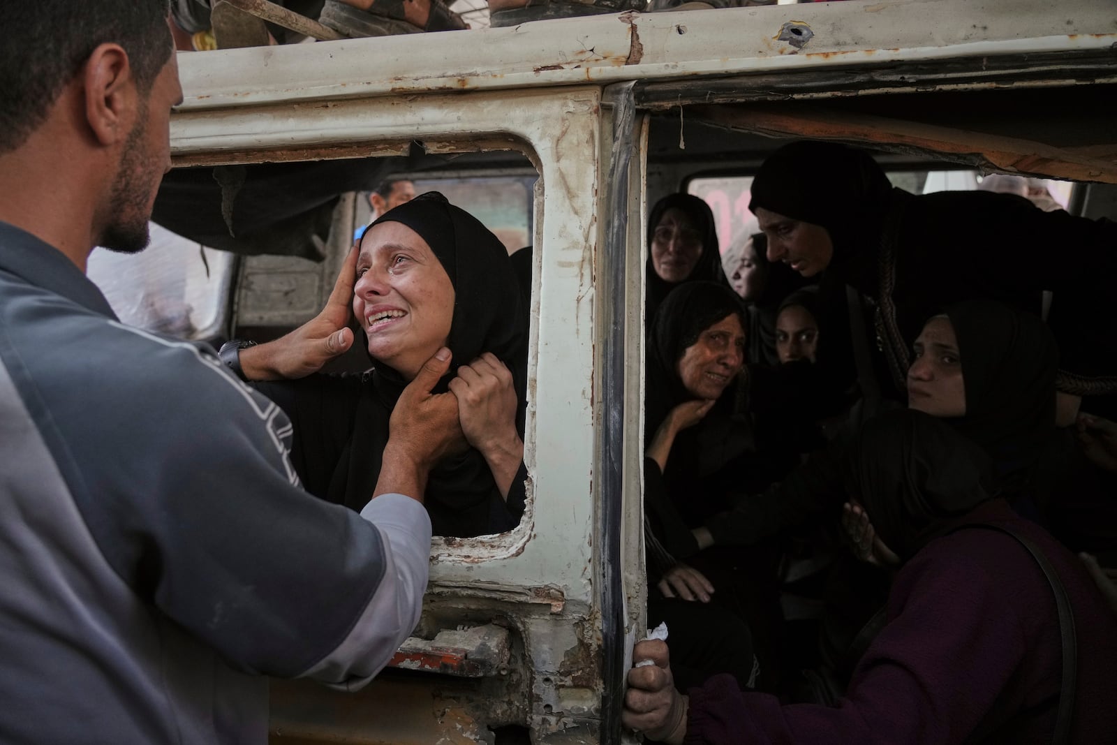 Palestinians mourn their relatives killed from an Israeli army bombardment of Gaza, at Shifa Hospital in Gaza City Tuesday, July 22, 2025. (AP Photo/Jehad Alshrafi)