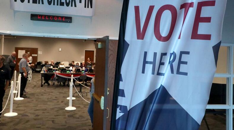 The last day to register to vote in November in Ohio is today. Early voting begins Tuesday. BILL LACKEY/STAFF