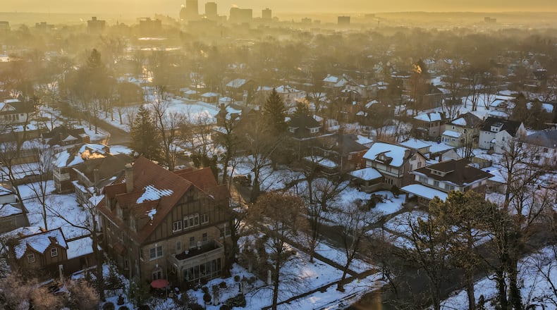 Aerial view of homes in the Dayton View Historic District with Dayton skyline in the background Wednesday, Feb. 11, 2026. NICK GRAHAM VIA DRONE/STAFF