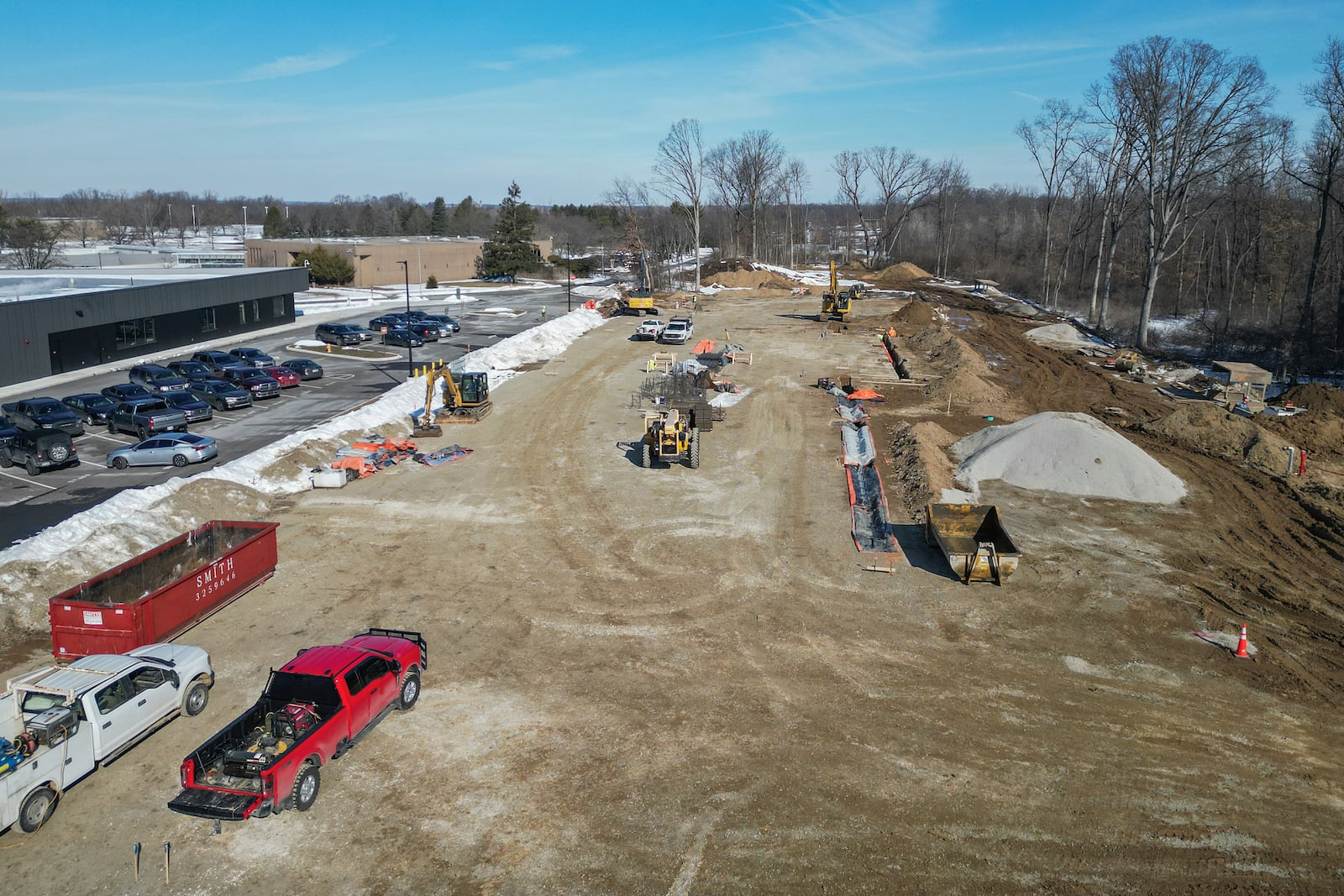 An aerial view of construction on the second phase of Global Impact STEM Academy's Upper Academy on Clark State College's campus on Thursday, Feb. 12, 2025. Phase one of the project was complete by May 2025 and opened in fall 2025. JOSEPH COOKE VIA DRONE / STAFF