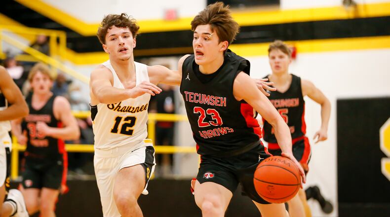 Cutline: Tecumseh High School junior Collin O'Connor drives past Shawnee sophomore Zane Mercer during their game on Friday night in Springfield. O'Connor had 16 points as the Arrows won 55-49. CONTRIBUTED PHOTO BY MICHAEL COOPER