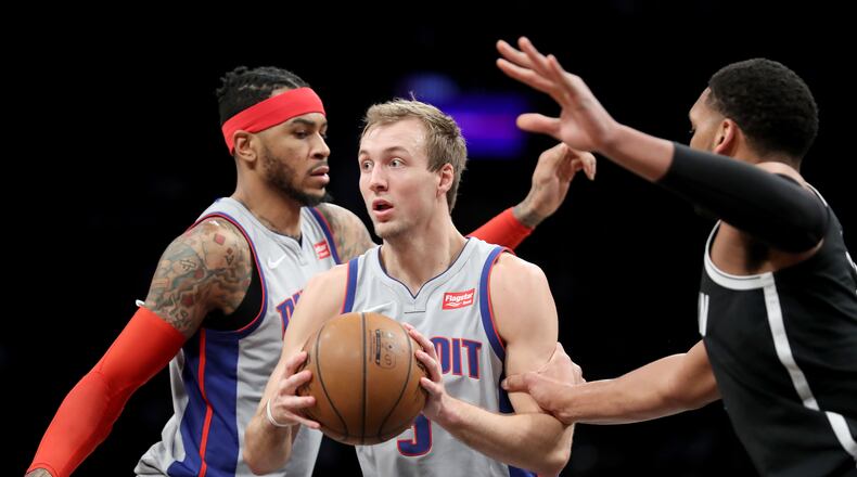 NEW YORK, NY - JANUARY 10: Luke Kennard #5 of the Detroit Pistons looks to pass the ball in the fourth quarter against the Brooklyn Nets during their game at Barclays Center on January 10, 2018 in the Brooklyn borough of New York City. NOTE TO USER: User expressly acknowledges and agrees that, by downloading and or using this photograph, User is consenting to the terms and conditions of the Getty Images License Agreement. (Photo by Abbie Parr/Getty Images)