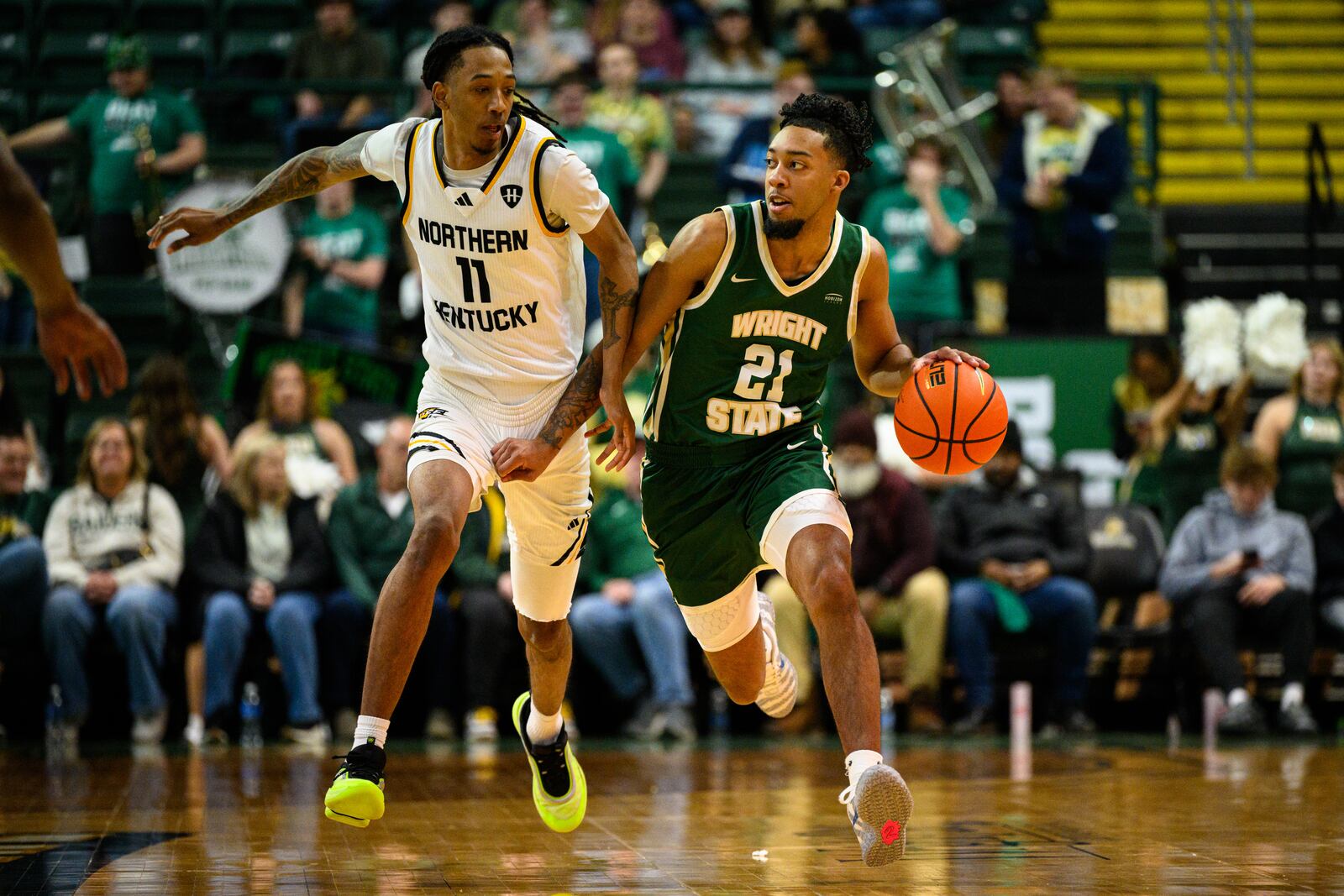 Wright State University's Logan Woods dribbles past Northern Kentucky University's Tae Dozier during their game on Saturday, Jan. 24, 2026. JEREMY MILLER / CONTRIBUTED PHOTO