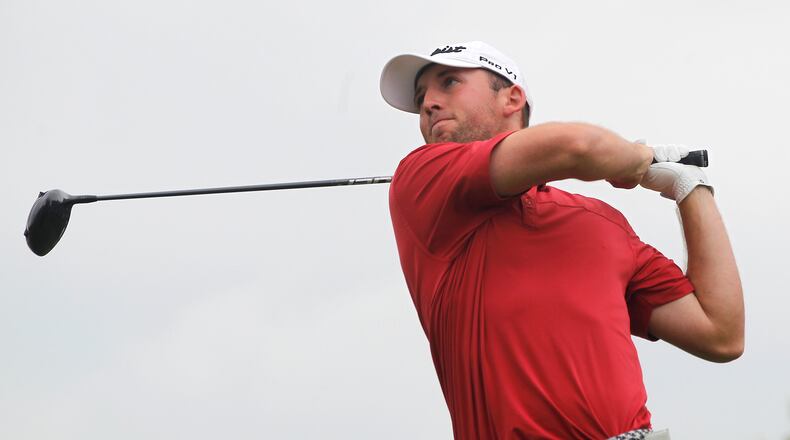 Austin Sipe, of Centerville, tees off after a rain delay Thursday during the third round of the Ohio Amateur at the Springfield Country Club this summer. Bill Lackey/Staff