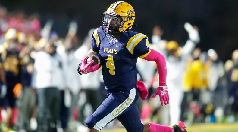 Springfield High School junior Jayvin Norman runs the ball during their game against Miamisburg on Friday night in Springfield. Norman scored a touchdown on the play.
CONTRIBUTED PHOTO BY MICHAEL COOPER