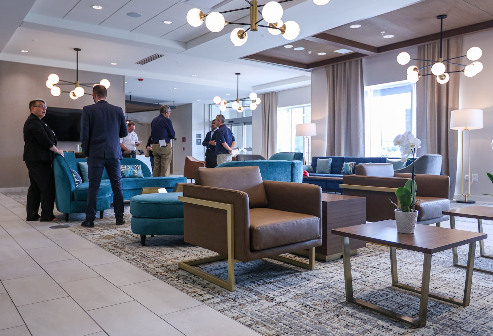 A view of the lobby of Fairfield Inn and Suites and TownePlace Suites next to Mall at Fairfield Commons in Beavercreek. The hotel celebrated its opening on Friday, Sept. 5. BRYANT BILLING / STAFF