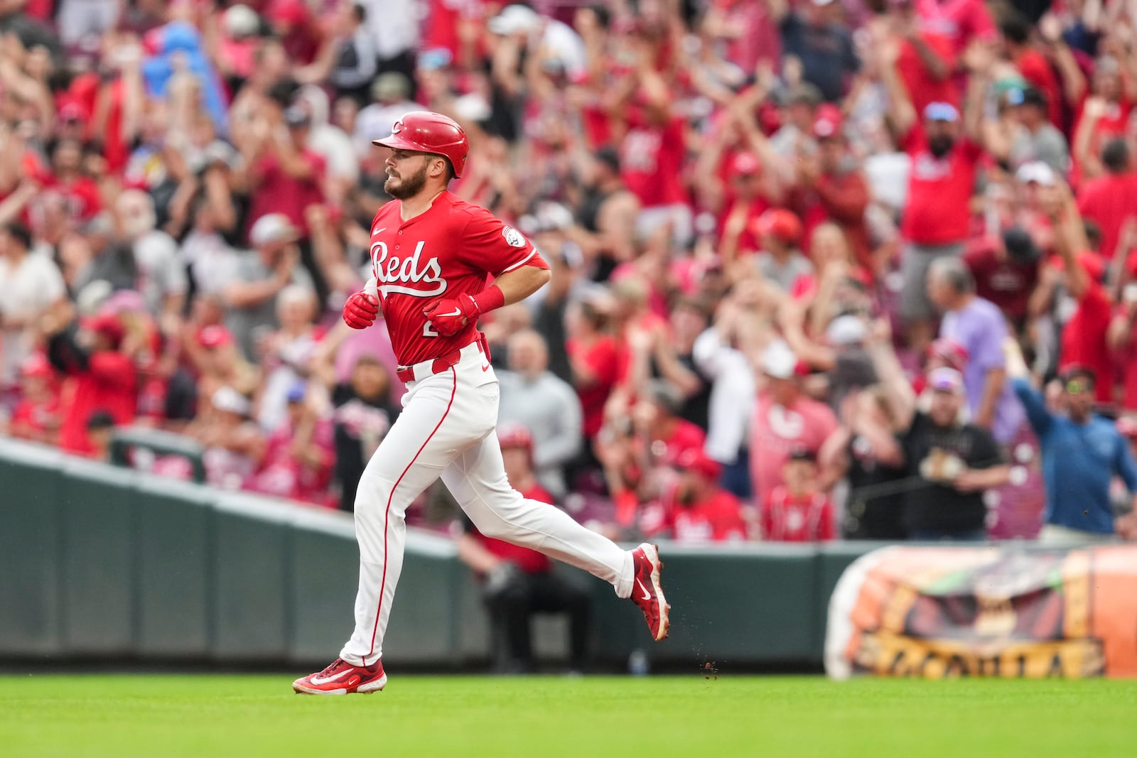 Cincinnati Reds' Gavin Lux rounds the bases after hitting a grand slam during the fourth inning of a baseball game against the Arizona Diamondbacks, Saturday, June 7, 2025, in Cincinnati. (AP Photo/Jeff Dean)