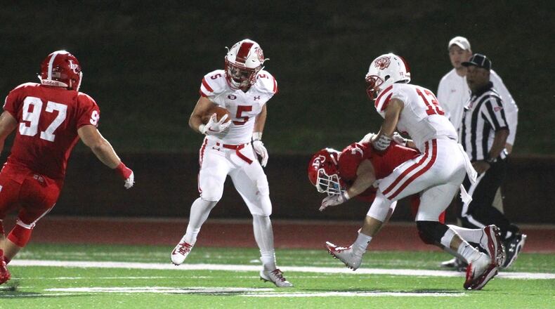 Wittenberg’s Nick Kendall runs against Denison on Saturday, Sept. 29, 2018, at Deeds Field in Granville. David Jablonski/Staff