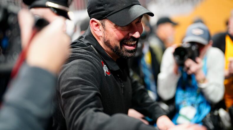Ohio State head coach Ryan Day celebrates after their win against Notre Dame in the College Football Playoff national championship game Monday, Jan. 20, 2025, in Atlanta. (AP Photo/Jacob Kupferman)