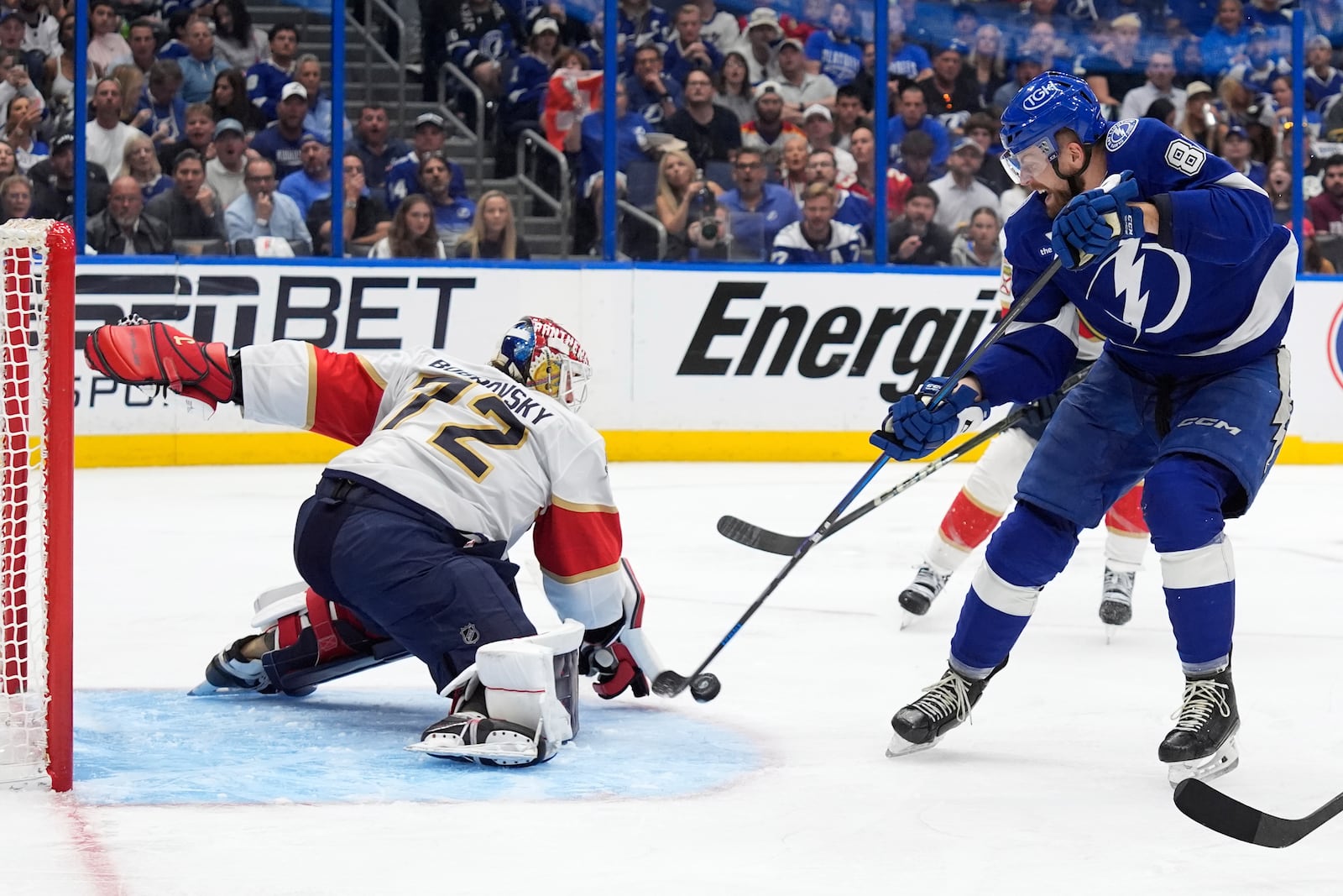 Florida Panthers goaltender Sergei Bobrovsky (72) stops a shot by Tampa Bay Lightning defenseman Erik Cernak (81) during the second period in Game 5 of an NHL hockey Stanley Cup first-round playoff series, Wednesday, April 30, 2025, in Tampa, Fla. (AP Photo/Chris O'Meara)