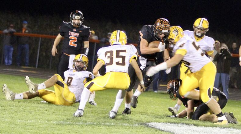 West Liberty-Salem’s Braden Miller runs the ball against West Jefferson at Tiger Stadium on Friday, Oct. 20. MICHAEL COOPER/STAFF