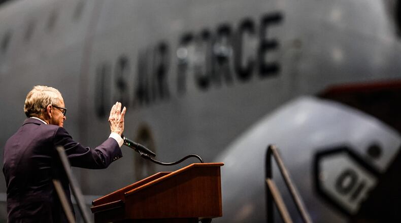 Ohio Gov. Mike DeWine held a news conference at the National Museum of the US Air Force Wednesday February 1, 2023, to promote his initiative to create new innovation hubs throughout the state. JIM NOELKER/STAFF