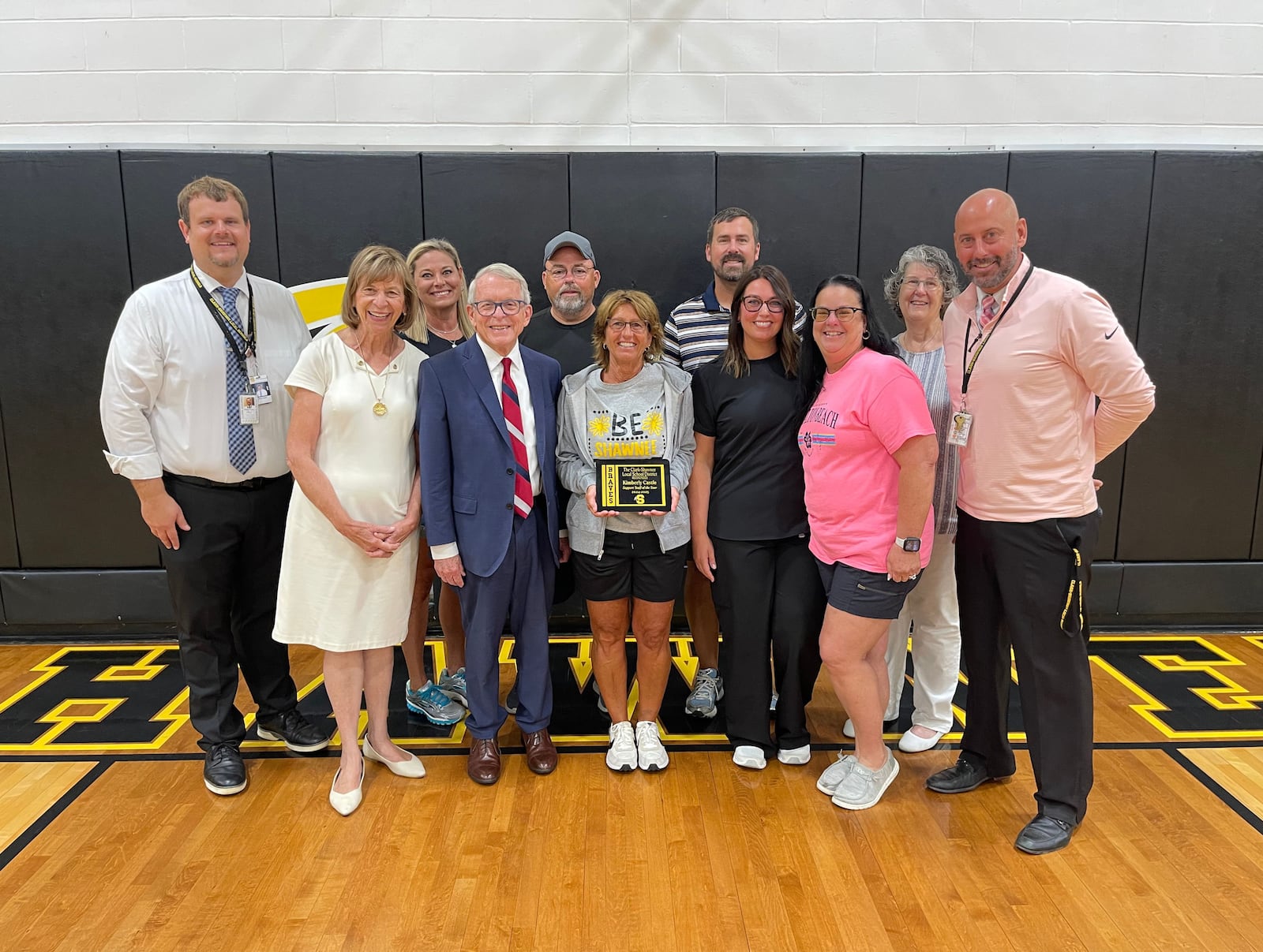Kim Castle, middle and high school cafeteria manager who received the Support Staff of the Year award during Clark-Shawnee Local School District’s Opening Day celebration with her family, friends and colleagues. Contributed
