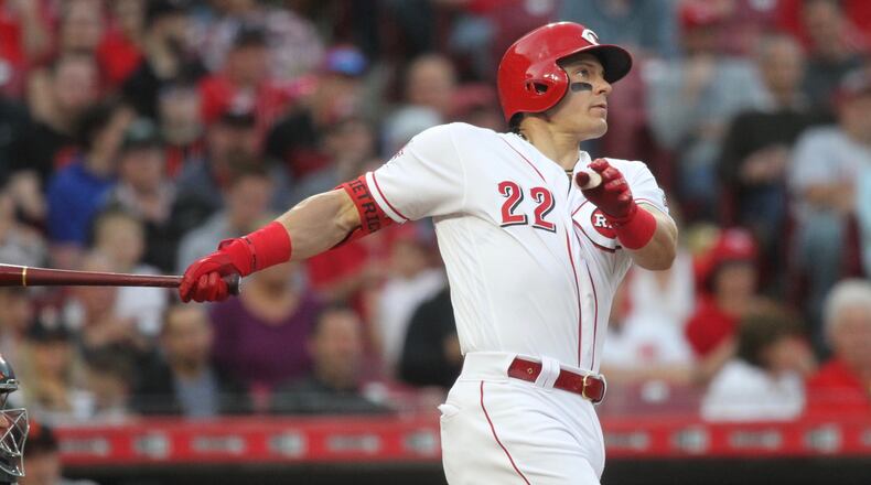 The Reds' Derek Dietrich hits a home run against the Giants on Friday, May 3, 2019, at Great American Ball Park in Cincinnati. David Jablonski/Staff