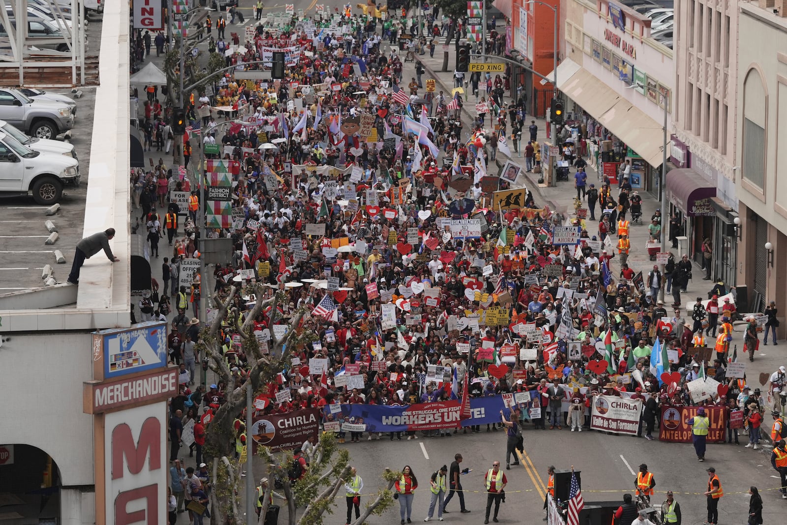 Demonstrators march during a May Day protest Thursday, May 1, 2025, in Los Angeles. (AP Photo/Jae C. Hong)