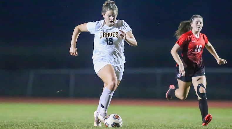 Shawnee High School senior Raegan Howdyshell shoots the ball during their game against Tecumseh on Monday, Sept. 13 at Spitzer Stadium in New Carlisle. The Braves won 5-0. CONTRIBUTED PHOTO BY MICHAEL COOPER