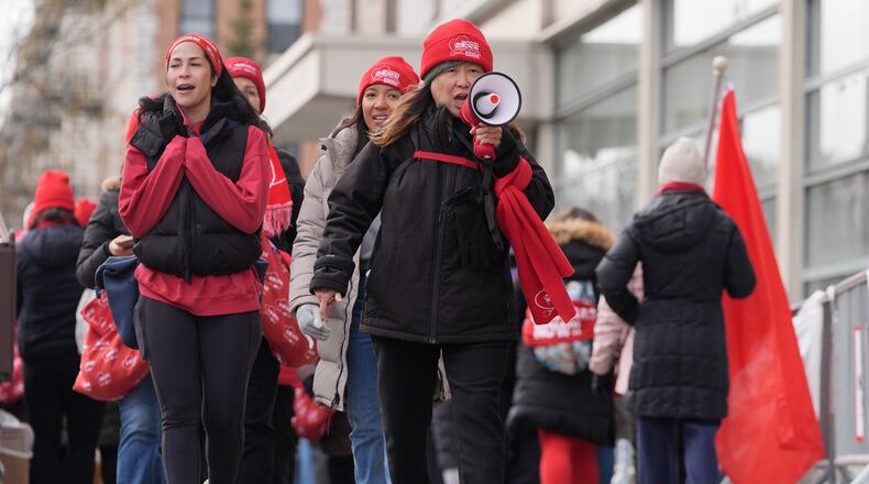 Nurses and their supporters strike in front of NewYork-Presbyterian hospital in New York, Thursday, Feb. 19, 2026. (AP Photo/Seth Wenig)