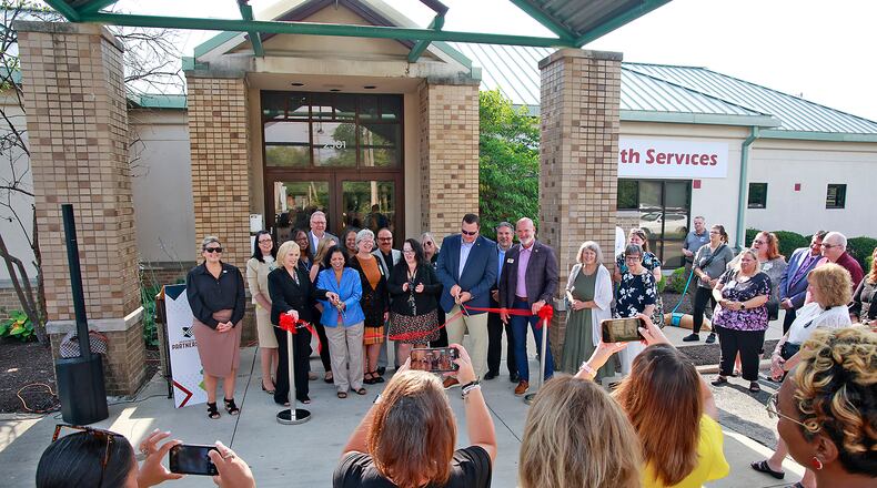 A ribbon cutting ceremony was held for Mental Health Services' new building on East High Street in Springfield Thursday, August 1, 2024. The new facility will house primary care services for patients and behavioral health services. BILL LACKEY/STAFF