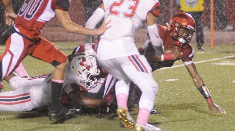 Trotwood RB William McDaniel makes a short gain during a 14-7 in a Week 10 GWOC crossover high school football defeat of visiting Wayne to complete a 10-0 regular season last Friday. MARC PENDLETON / STAFF